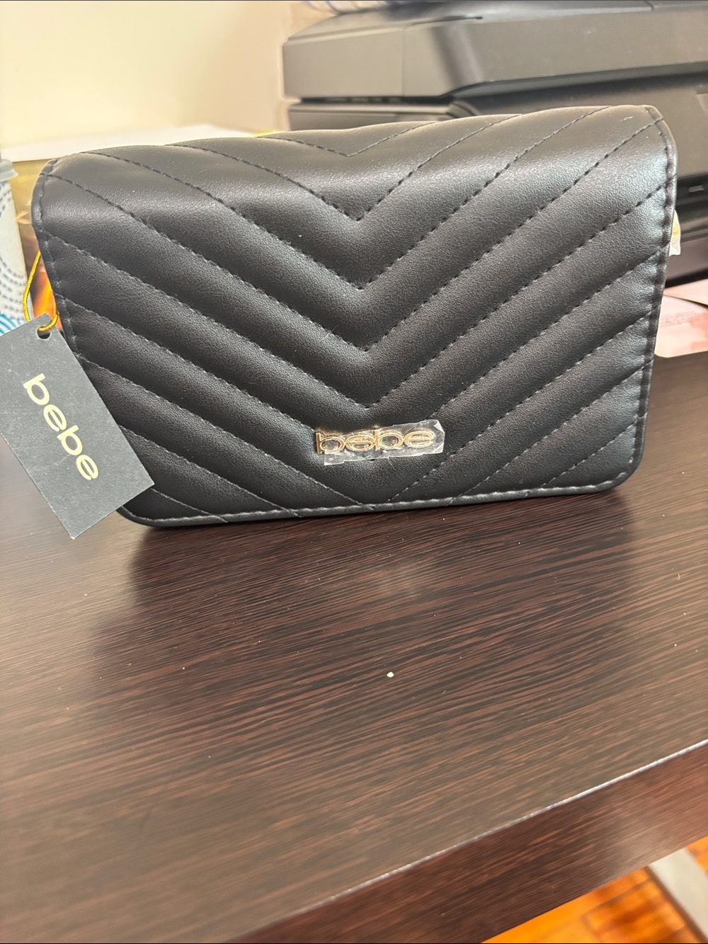 bebe Black Quilted crossbody bag  with Gold Logo